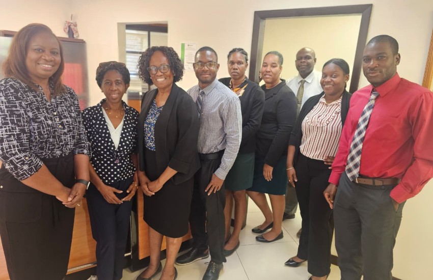 The Cabinet Secretary Ms. Sandra Ward (third-left) and Team with Chair of the Executive Committee for the 250th Anniversary of the Self-Manumission of the Long Look Free People celebration and Co-Chair of the Long Look/East End Heritage Committee, Ms. Bernadine Louis (second left).