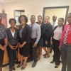 The Cabinet Secretary Ms. Sandra Ward (third-left) and Team with Chair of the Executive Committee for the 250th Anniversary of the Self-Manumission of the Long Look Free People celebration and Co-Chair of the Long Look/East End Heritage Committee, Ms. Bernadine Louis (second left).