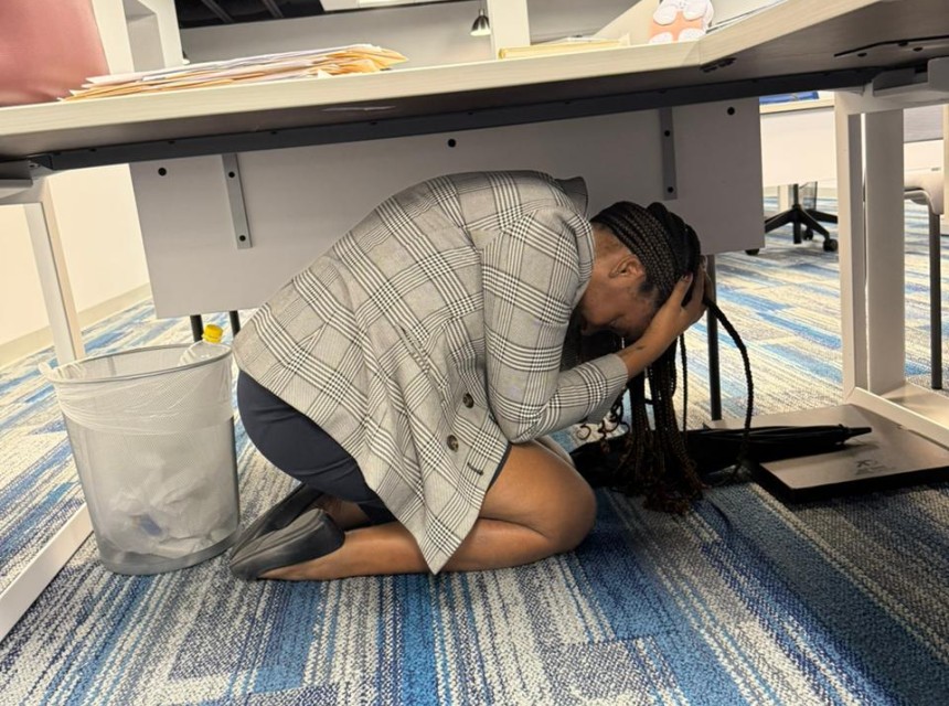 A Ministry of Financial Services staff member participating in the October 16 ShakeOut exercise